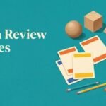 Colorful game cards, geometric shapes, and a mini whiteboard for classroom math review.